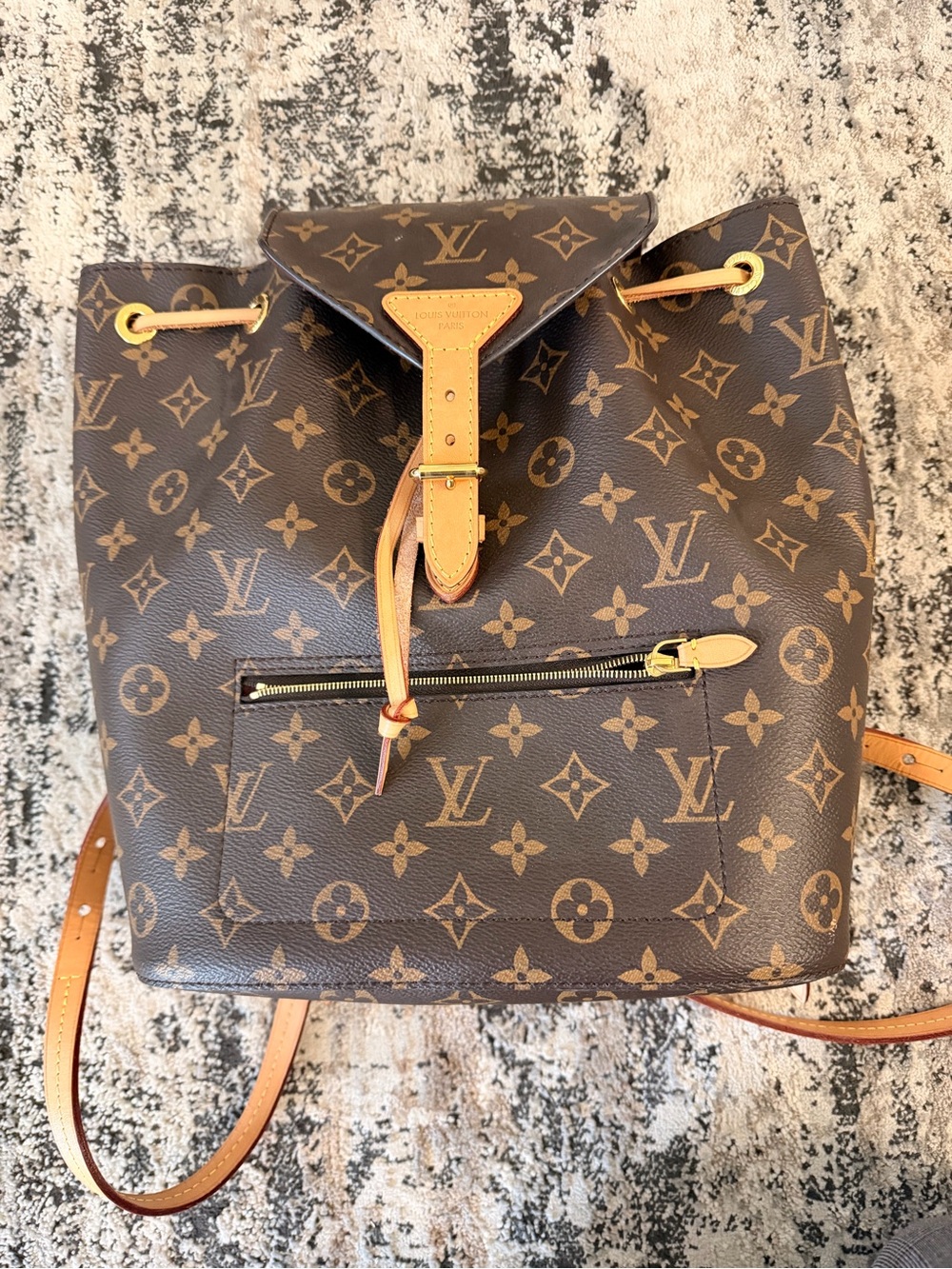 Louis Vuitton Monogram Canvas Drawstring Backpack in Brown and Tan